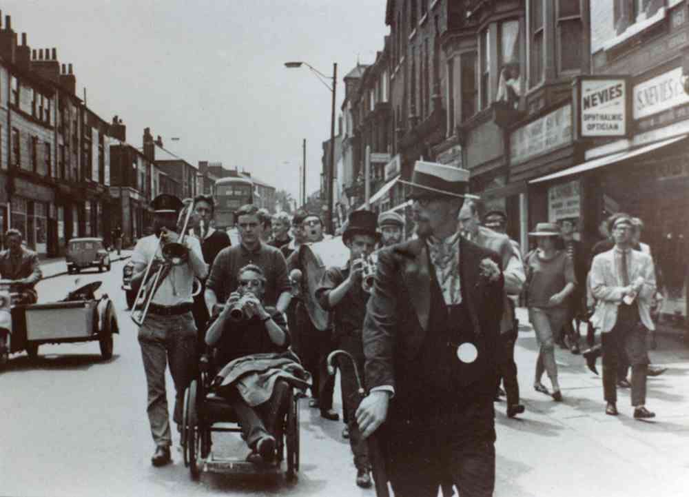 Tyke Day Parade, North Street. Ed O’Donnell on trombone, Glen Baxter providing the transport, Bernard Wild on the drum and Cliff Wood pounding the pavement. Photograph courtesy of Cliff Wood.